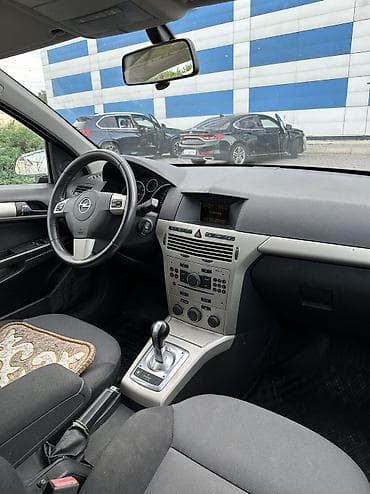 мерседес т 1: Opel Astra: 2008 г., 1.6 л, Робот, Бензин, Универсал — 7