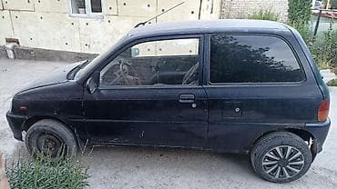 bmw e23: Daihatsu Cuore: 1999 г., Механика, Хэтчбэк — 2