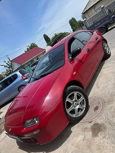 mini coper: Mazda 323: 1995 г., Механика, Бензин — 1