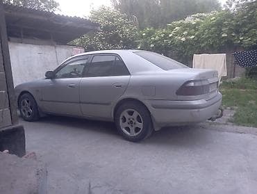 Mazda Capella: 1991 г., 1.8 л, Механика, Газ, Седан