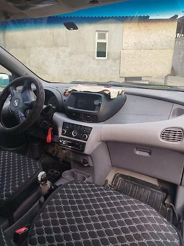 авто выхлоп: Nissan Almera Tino: 2003 г., 1.8 л, Механика, Бензин, Хэтчбэк — 6