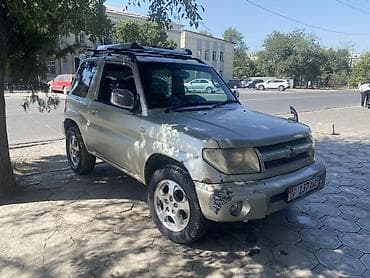 mini v: Mitsubishi Pajero iO: 1999 г., 1.8 л, Автомат, Бензин, Внедорожник — 8
