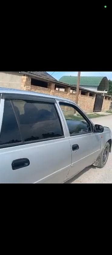 некция 3: Daewoo Nexia: 2010 г., Механика, Бензин, Седан — 4