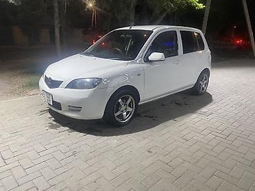 Транспорт: Mazda Demio: 2003 г., 1.3 л, Автомат, Бензин, Хэтчбэк — 2