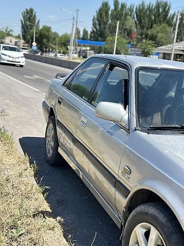 210 mers: Mazda 626: 1988 г., 2.2 л, Механика, Бензин, Седан — 2