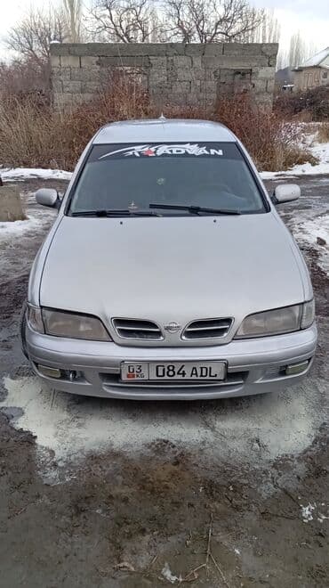 Nissan Primera: 1997 г., 2 л, Механика, Газ, Седан