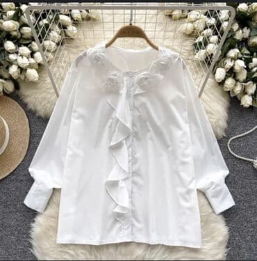 сумка для мяча: Белая женская блузка с длинным рукавом и оригинальным декором. Модель — 2