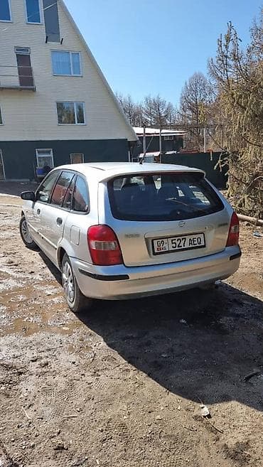 мазда 621: Mazda 323: 1999 г., Автомат, Универсал — 3