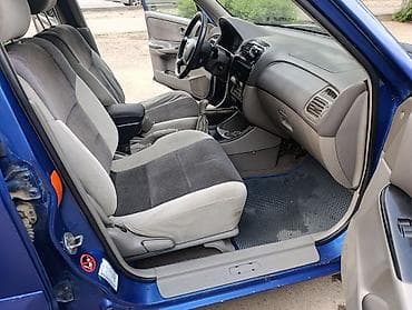 сткл: Mazda Capella: 2000 г., 1.8 л, Механика, Бензин, Универсал — 10