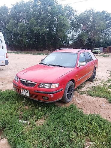 Mazda 626: 1999 г., Механика, Универсал — 4