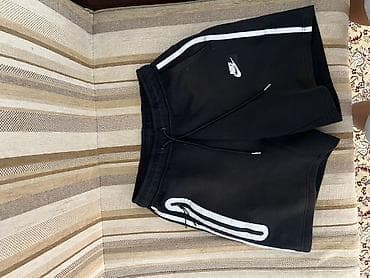 Спортивные шорты Nike, черные - Классический крой до колена - — 1