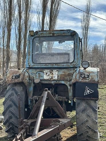 Тракторы ХТЗ: Трактор колесный с кабиной, класс тяги примерно 1,4–2,0 (типовая — 6