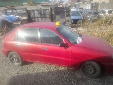 где можно купить шины дешевле: Chevrolet Lanos: 1998 г., Механика, Бензиновая, Седан — 1