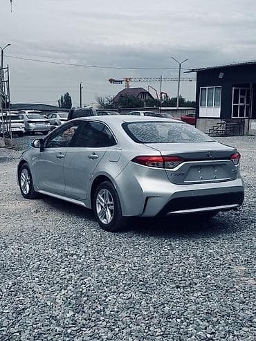 рага авто: Toyota Corolla: 2021 г., 1.8 л, Вариатор, Гибрид, Седан — 7