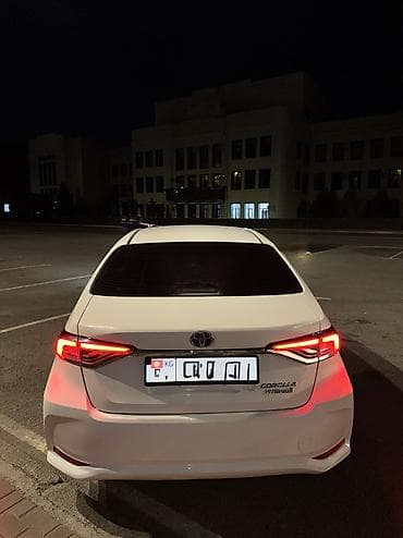 byd e2 2021: Toyota Corolla: 2021 г., 1.8 л, Автомат, Гибрид, Седан — 2
