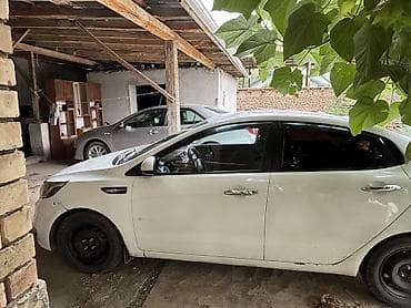 Kia Rio: 2016 г., 1.4 л, Кол менен иштөөчү, Бензин, Седан — 5