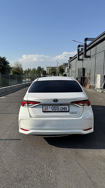 byd e2 2023: Toyota Corolla: 2022 г., 1.8 л, Вариатор, Гибрид, Седан — 2