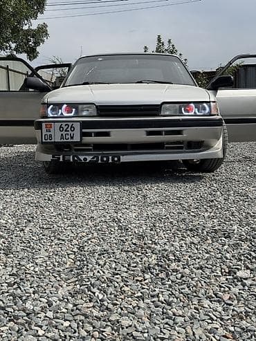 паук бмв: Mazda 626: 1988 г., 0.2 л, Механика, Бензин, Седан — 6