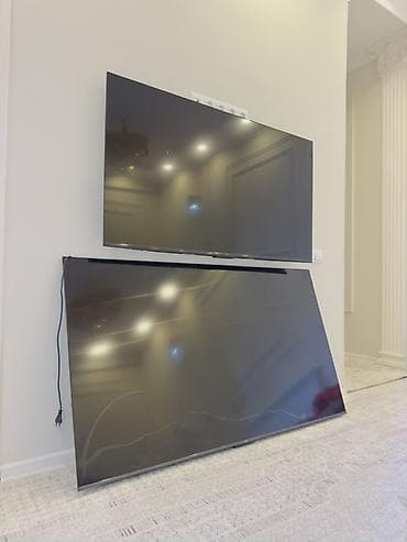 iphone x 64gb: Большой телевизор с плоской панелью, диагональ ориентировочно 75–85" — 1