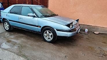 opel vektra: Mazda 323: 1994 г., 1.6 л, Ручные, Бензин, Хэтчбэк — 1