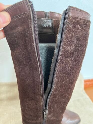 обувь для охоты: Пара коричневых сапог до колена. Изготовлены из натуральной кожи и — 6