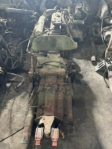 Двигатель в сборе с коробкой передач и навесным Описание: - Полный