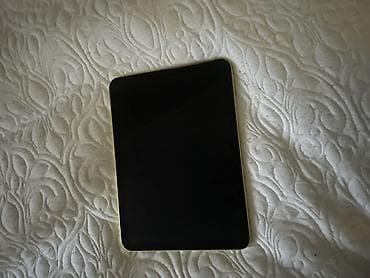 Планшет Apple iPad mini (цвет жёлтый) - Компактный корпус с плоскими