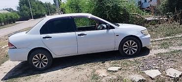 Транспорт: Mitsubishi Lancer: 2000 г., 1.5 л, Механика, Бензин, Седан — 3