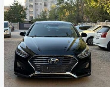 Аренда авто (Такси) Белый седан Hyundai Sonata с динамичным дизайном