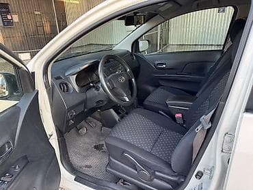 byd e1: Daihatsu Cuore: 2009 г., 1 л, Автомат, Бензин, Хэтчбэк — 5