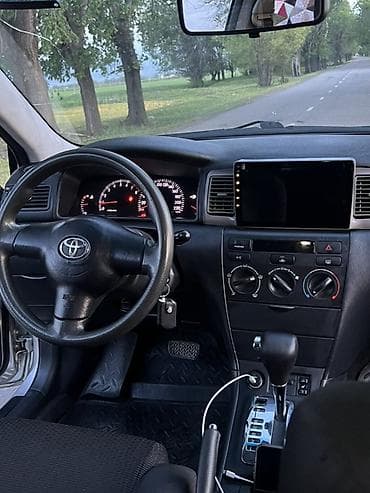 е 318: Toyota Corolla: 2004 г., Автомат, Бензин, Седан — 4