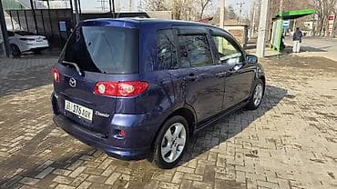лизинг компания: Mazda Demio: 2005 г., 1.3 л, Бензин — 6