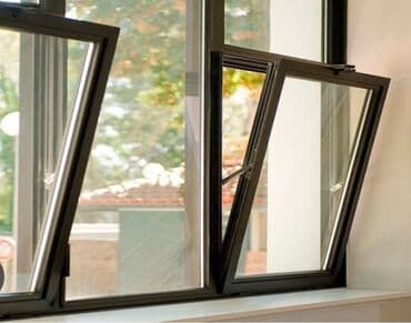 общий ключ: Откидно-поворотное окно с прочной темной рамой, оснащенное двойным — 2