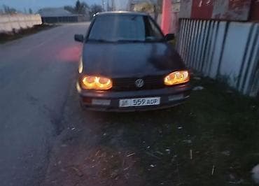 x 7: Volkswagen Golf: 1993 г., Механика, Хэтчбэк — 5