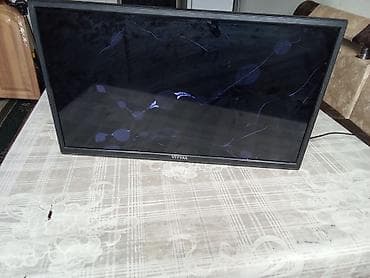 iphone хr: Телевизор VITYAS (жк/LED), диагональ около 24–26". На корпусе сзади — 3