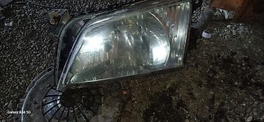 импульсный свет: Фара передняя для Mazda Demio, 2001 г. - Оригинальная галогенная фара — 3