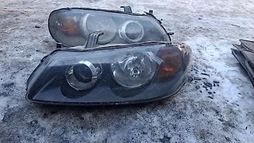 Рулевая часть: Передняя левая фара Nissan 2004 г., Б/у, Оригинал — 1