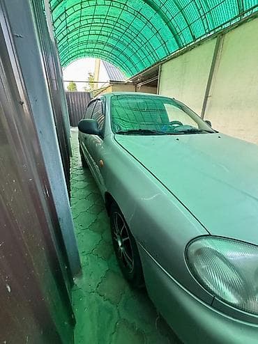 Унаа: Chevrolet Lacetti: 2011 г., 1.5 л, Кол менен иштөөчү, Бензин, Седан — 5