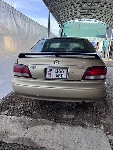 80 b4: Mazda 626: 1998 г., 2 л, Механика, Бензин, Седан — 1