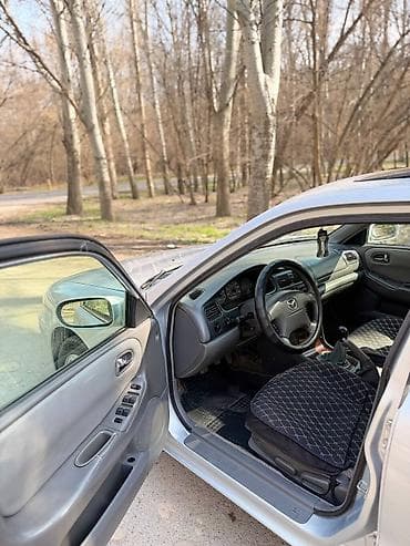 audi q4: Mazda 626: 2000 г., 2.5 л, Ручные, Бензин, Седан — 8