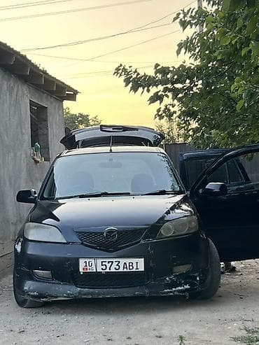 bid e5: Mazda 3: 2003 г., 1.5 л, Автомат, Бензин, Хэтчбэк — 1