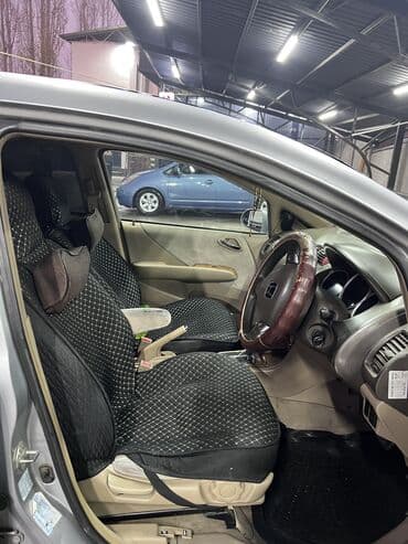 меняю дом на машину: Honda Fit Aria: 2004 г., 1.5 л, Вариатор, Бензин, Седан — 9