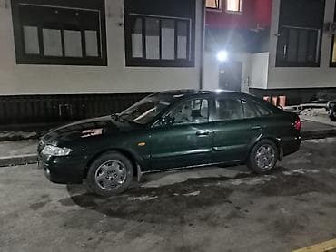 65 style: Mazda 626: 1999 г., 1.8 л, Механика, Бензин, Седан — 4