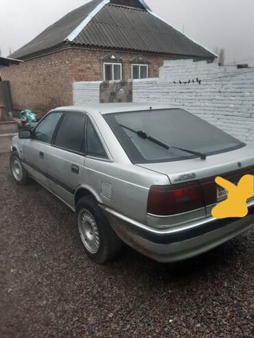 Mazda 626: 1989 г., 2 л, Механика, Седан