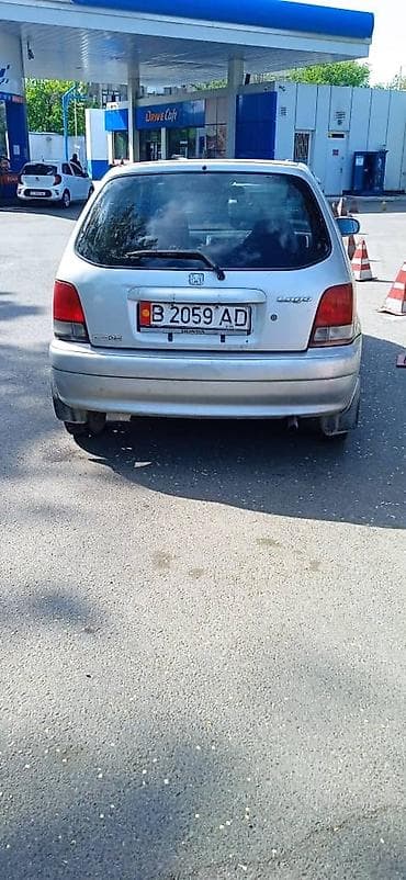 honda hybrid: Honda Logo: 2000 г., 1.3 л, Автомат, Хэтчбэк — 3