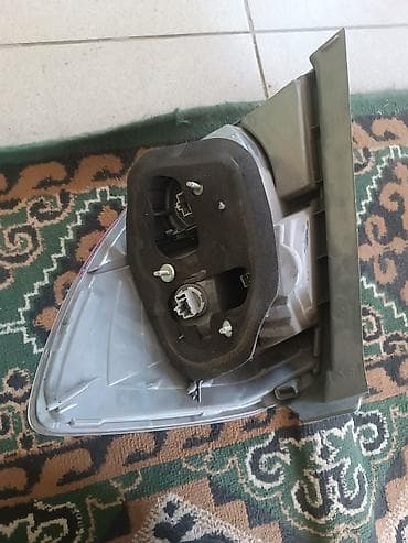 задние стопы: Задний фонарь (левый) для автомобиля. honda jazz Описание: - — 2