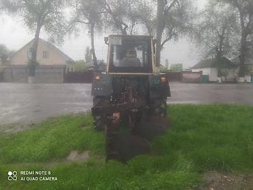 шина комбайн: Трактор колесный с кабиной + навесной плуг Описание: - Универсальный — 3