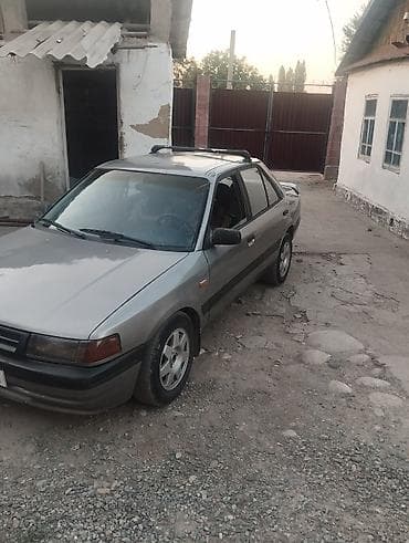 1: Mazda 323: 1989 г., 1.6 л, Механика — 4