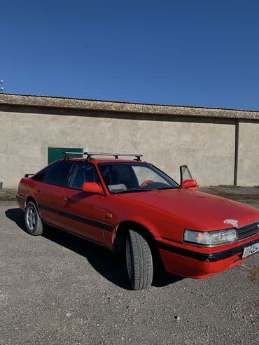 кассеты аудио: Mazda 626: 1991 г., 2 л, Механика, Бензин, Хэтчбэк — 10