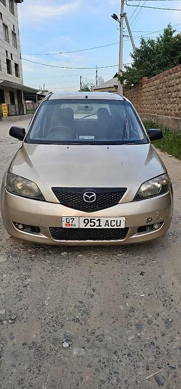 Mazda Demio: 2003 г., 1.5 л, Хэтчбэк